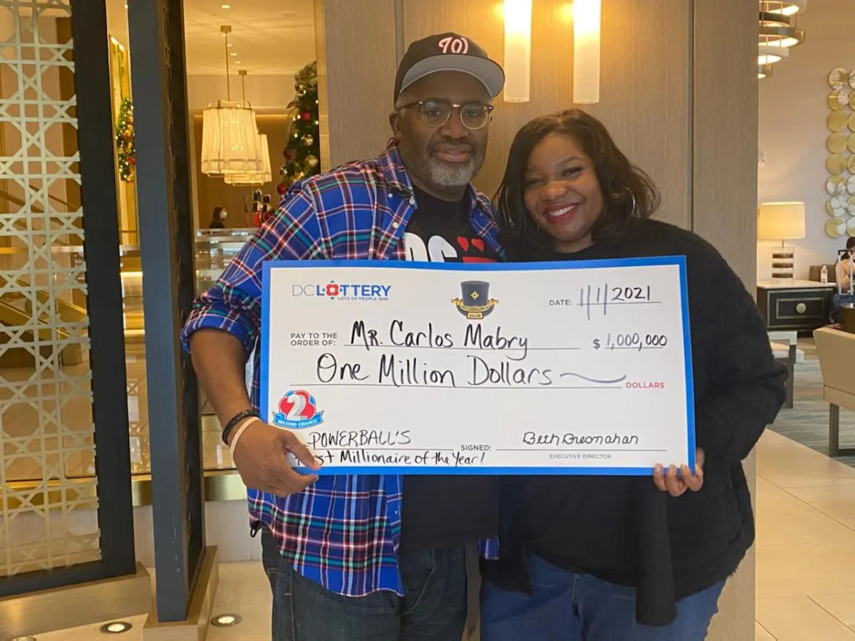 DC's Carlos Mabry wins POWERBALL's First Millionaire of the Year!
