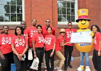 DC Lottery staff with Mega Millions mascot