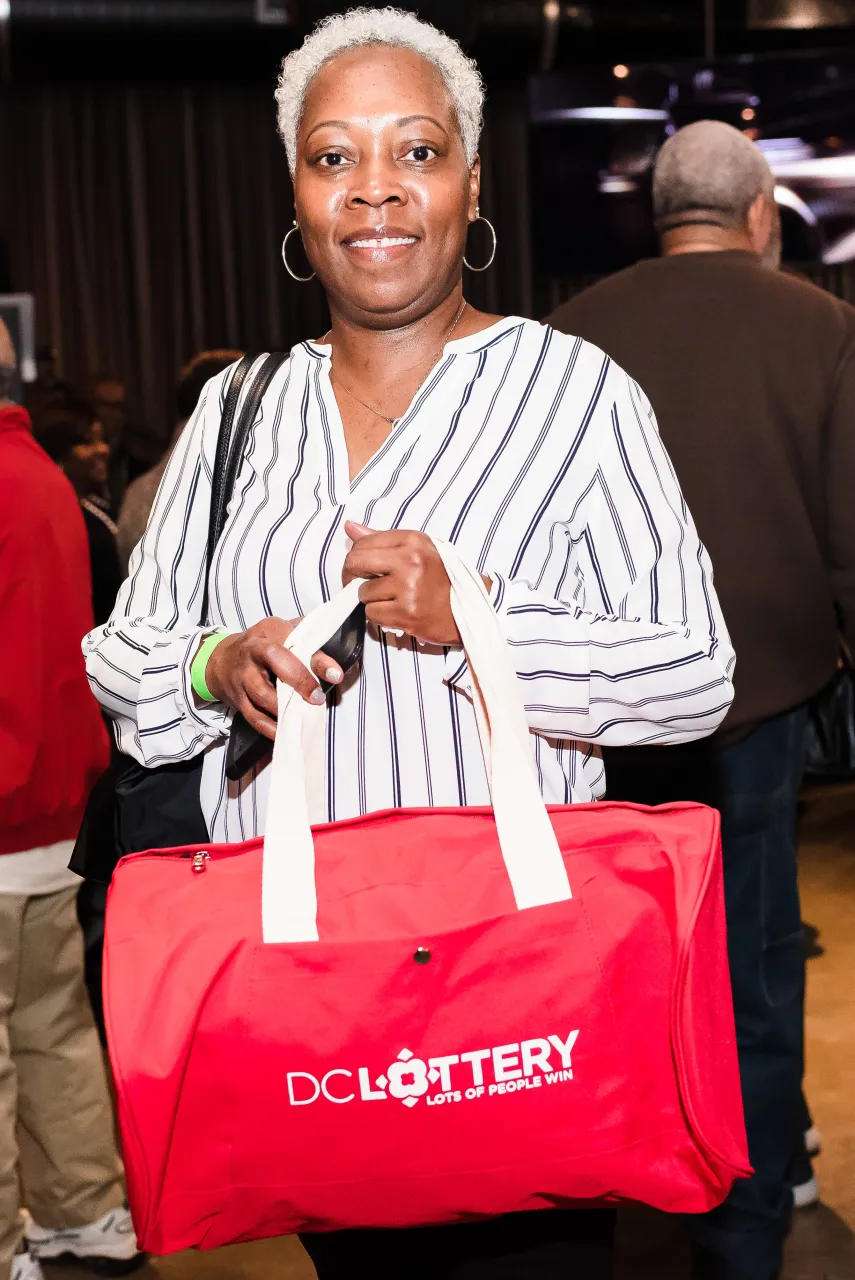 Woman holding prize pack